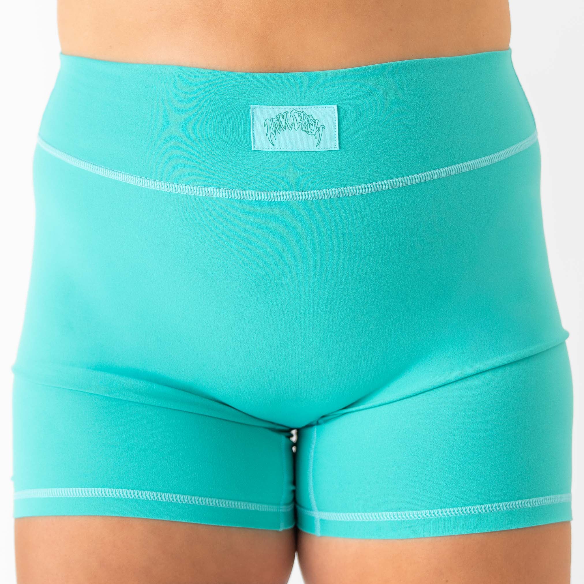 MID RISE COLOR BLOCK BIKER SHORT - TEAL